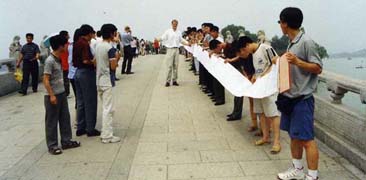 presenting 12008 signatures on the 17 acre bridge